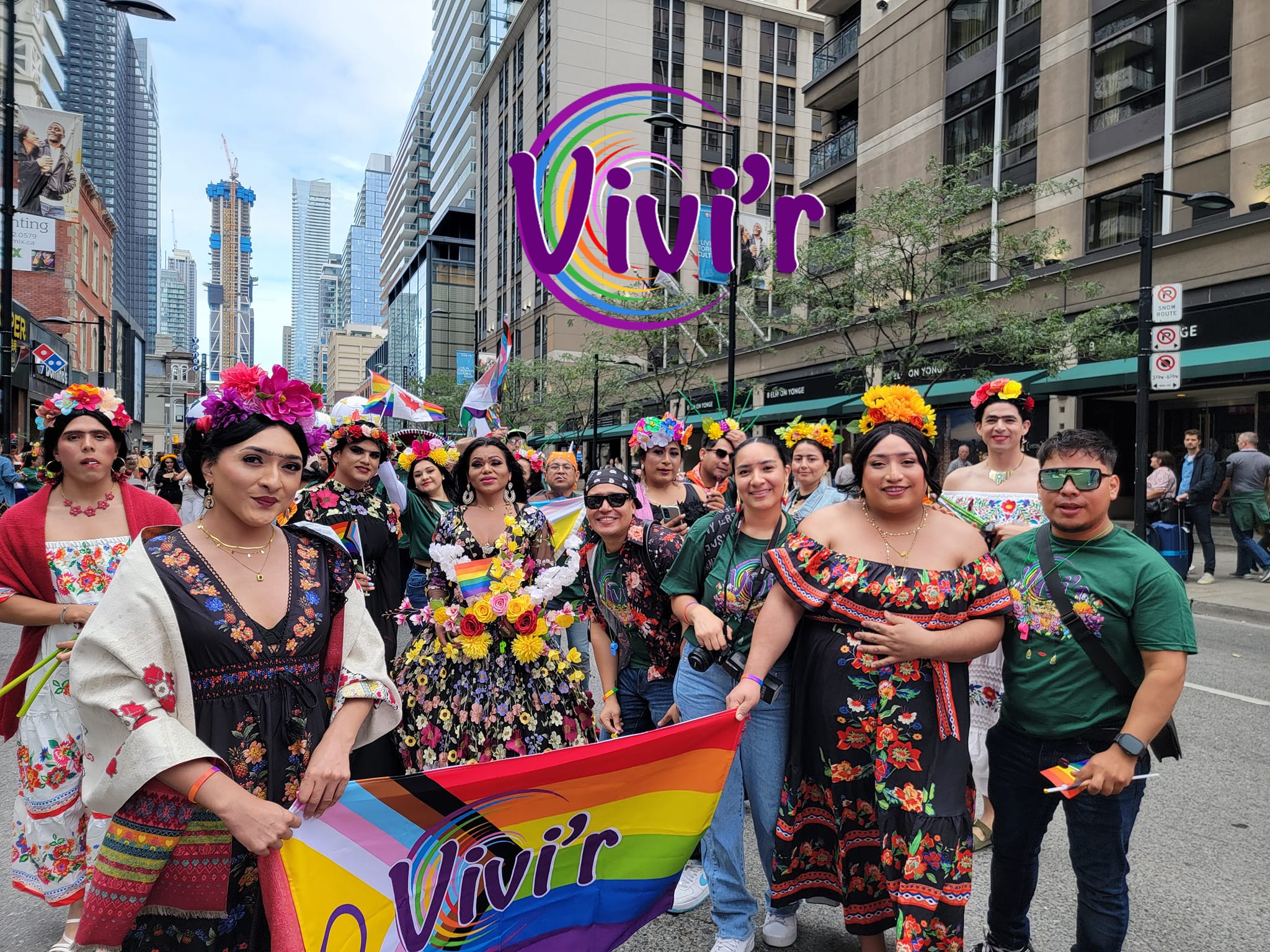 VIVI'R members in traditional Latin American dresses at Toronto Pride